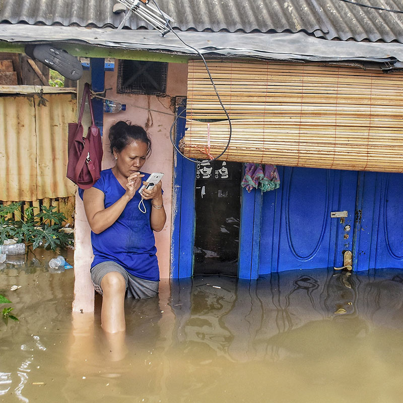 Woman in flooded water